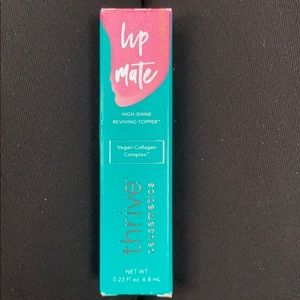 Thrive Lip Gloss in shade EFFIE